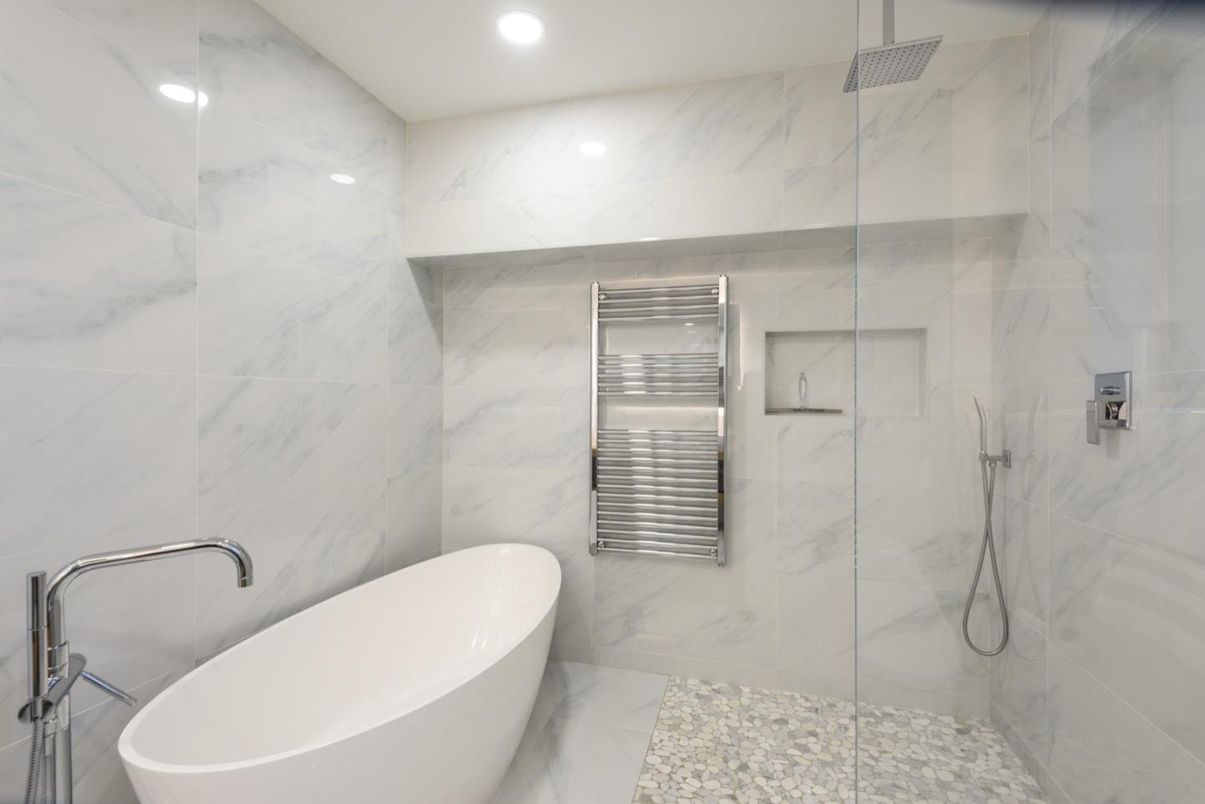 Bathroom, Free Standing Baths, Glass Shower, Interior, Marble Walls, Recessed Lighting