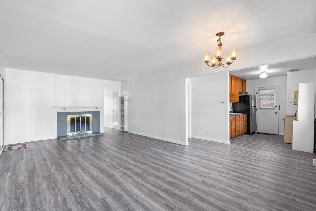 Chandelier, Empty room, Fireplace, Interior, Kitchen, Wood Texture Flooring
