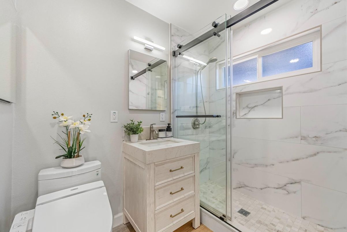 Bathroom, Dual Sink Vanities, Glass Shower, Interior, Marble Walls, Recessed Lighting