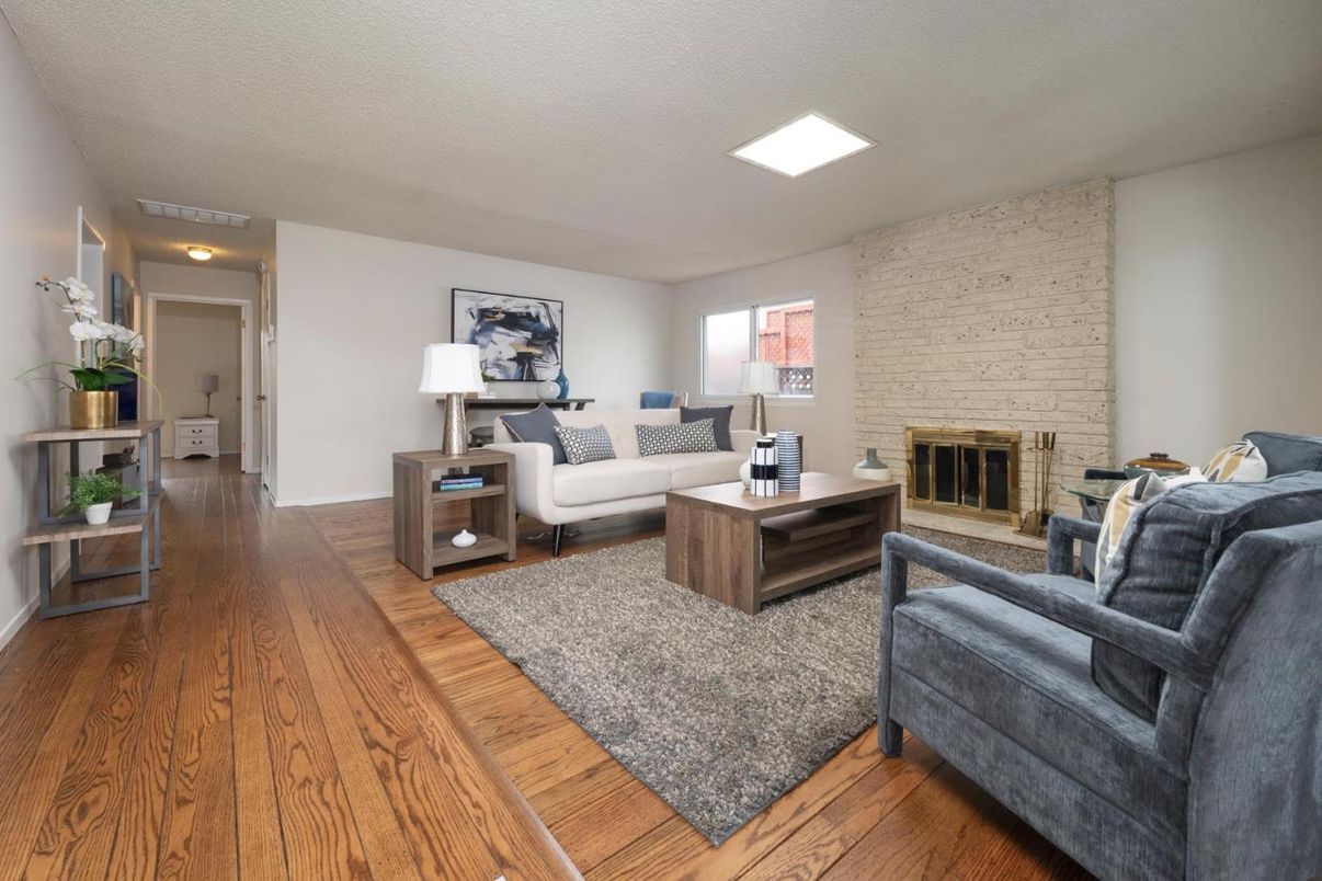 Fireplace, Interior, Living room, Recessed Lighting, Stone Walls, Wood Texture Flooring