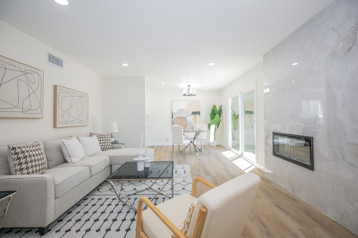 Chandelier, Dining room, Fireplace, Interior, Living room, Recessed Lighting, Wood Texture Flooring