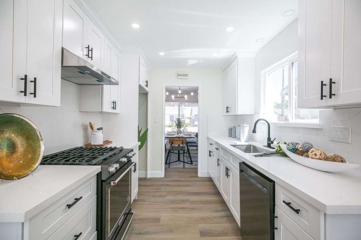Dining room, Interior, Kitchen, Recessed Lighting, Stainless Steel Appliances, Wood Texture Flooring