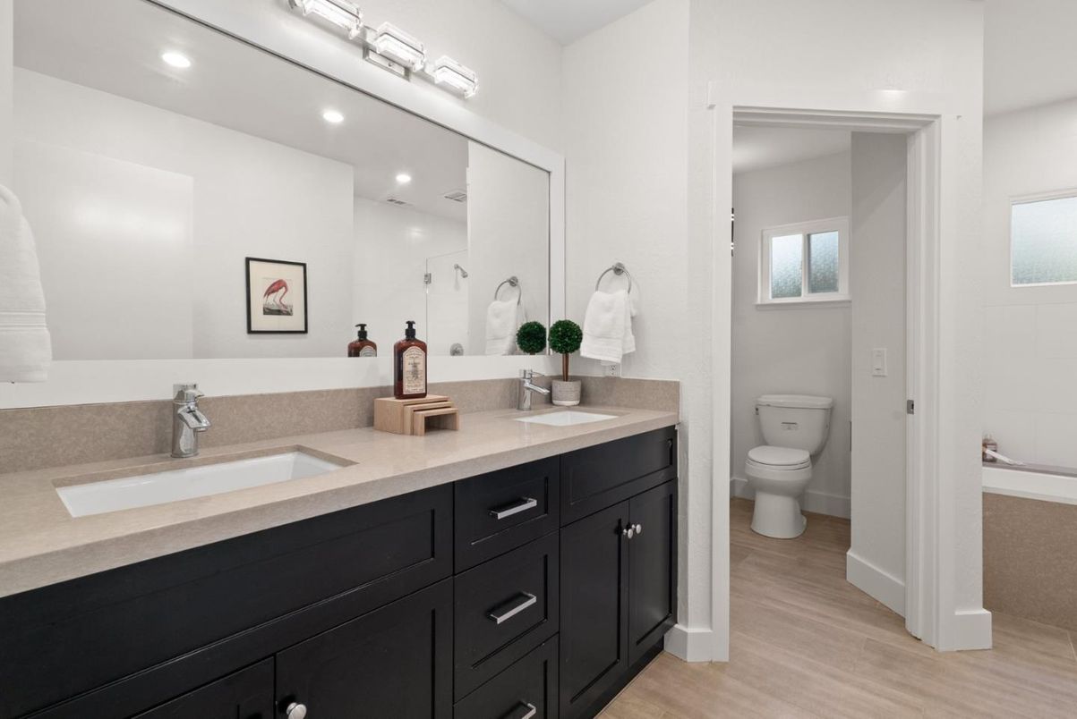 Bathroom, Dual Sink Vanities, Interior, Recessed Lighting, Wood Texture Flooring