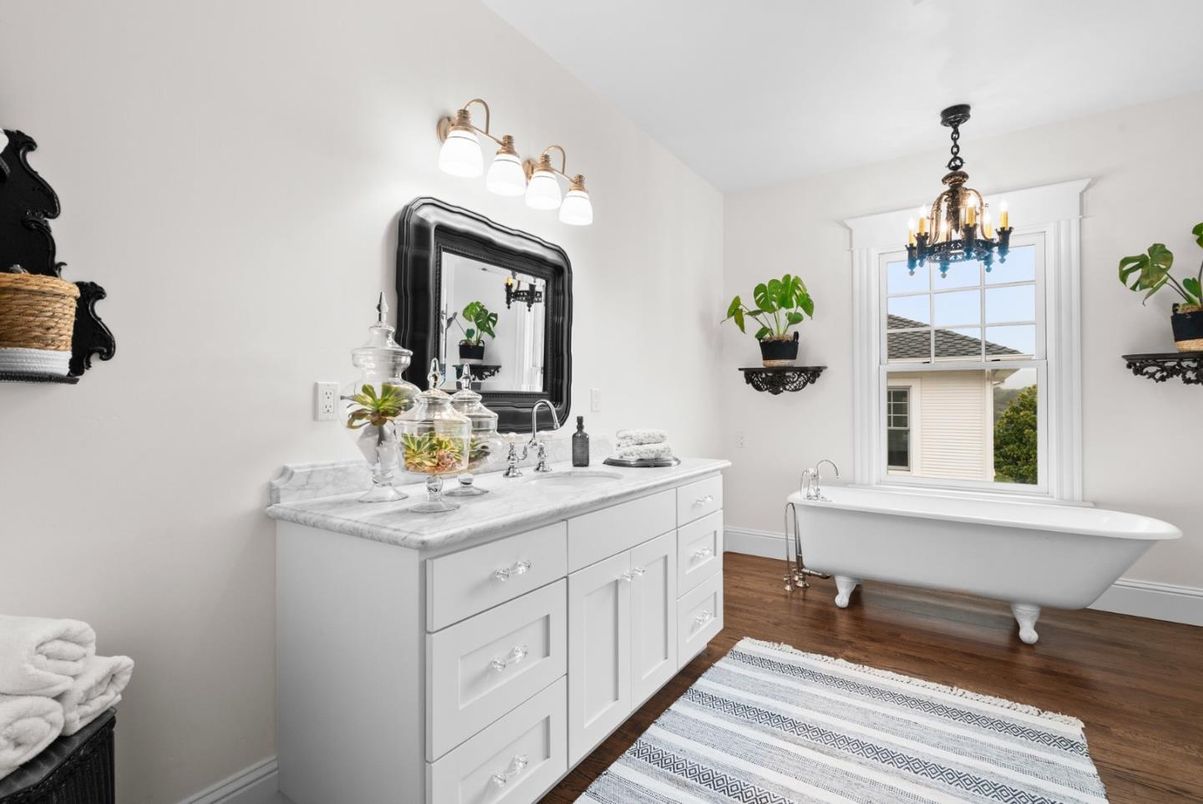Bathroom, Chandelier, Dual Sink Vanities, Free Standing Baths, Interior, Wood Texture Flooring