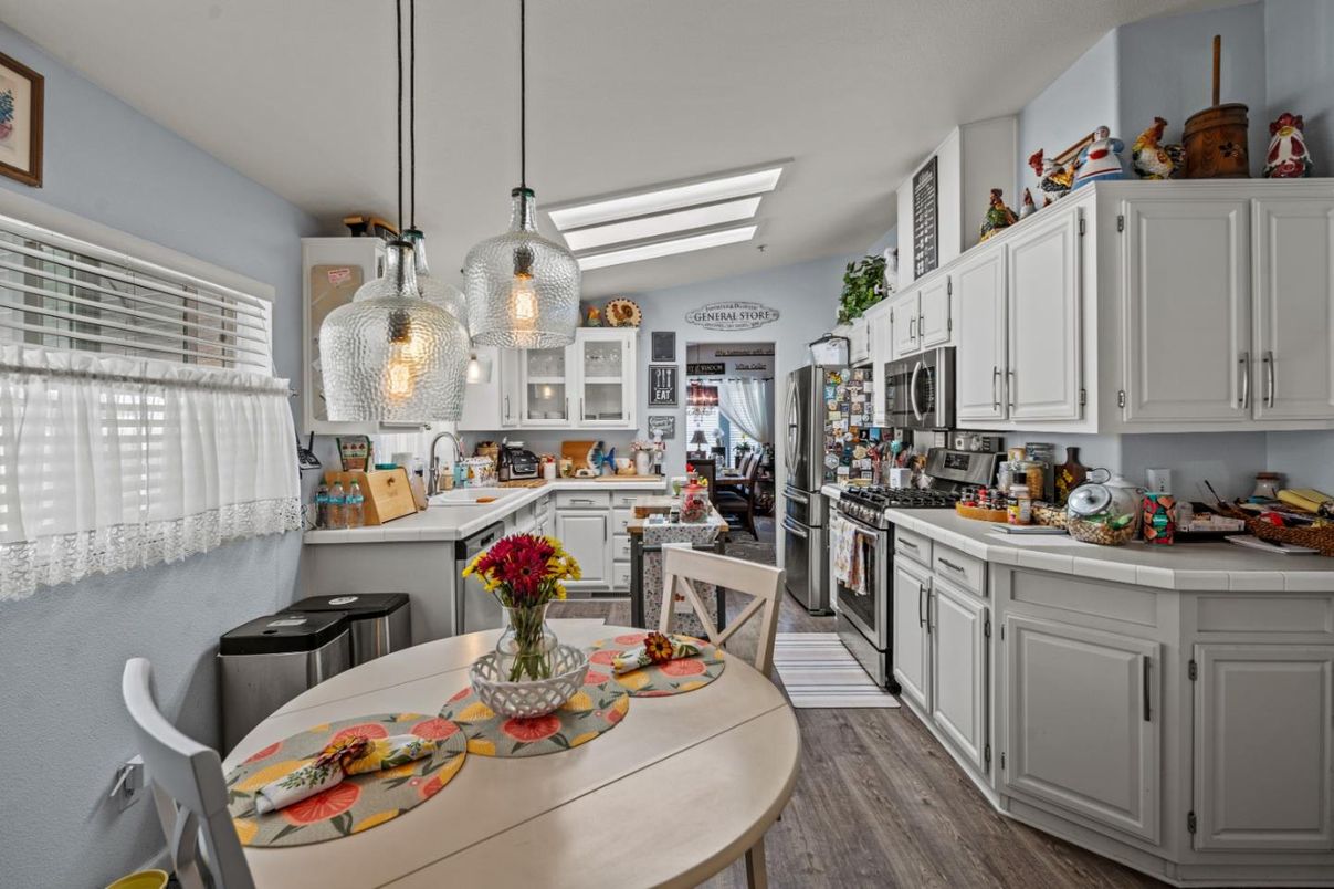 Interior, Kitchen, Pendant Lights, Tile Countertops, Wood Texture Flooring