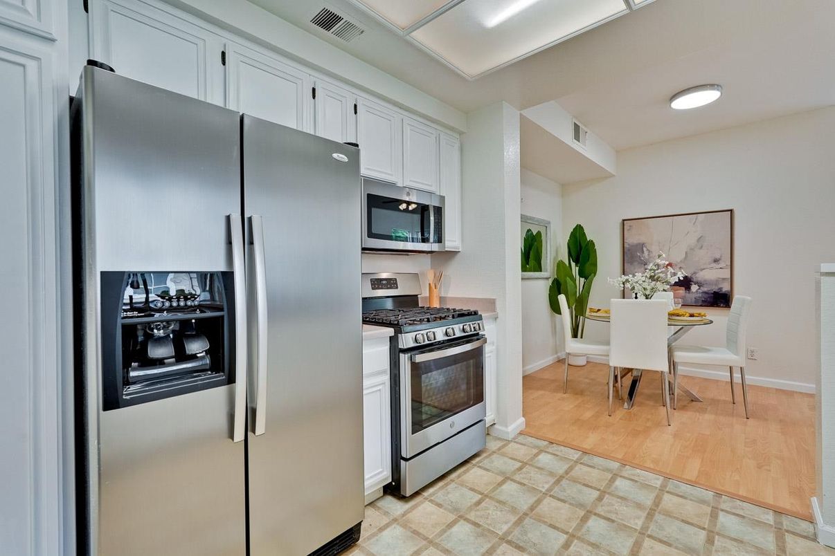 Dining room, Interior, Kitchen, Recessed Lighting, Stainless Steel Appliances, Wood Texture Flooring