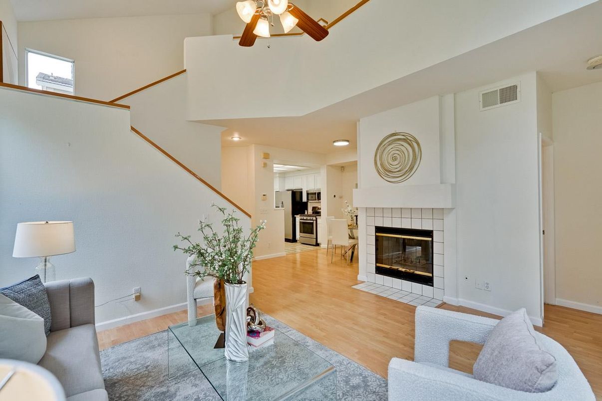Fireplace, Interior, Kitchen, Living room, Recessed Lighting, Stainless Steel Appliances, Wood Texture Flooring