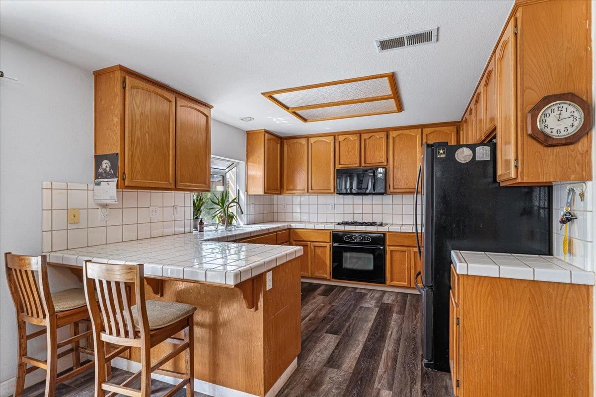 Interior, Kitchen, Tile Countertops, Wood Texture Flooring