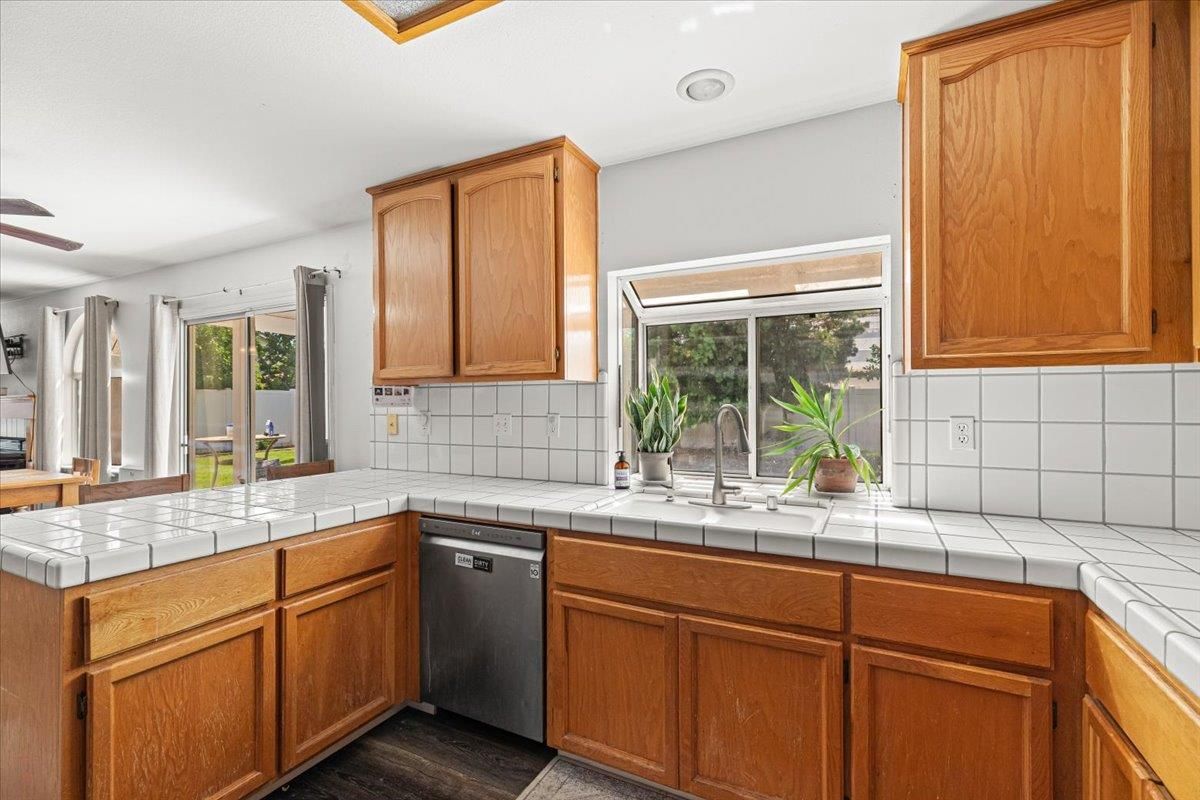 Interior, Kitchen, Recessed Lighting, Tile Countertops, Wood Texture Flooring
