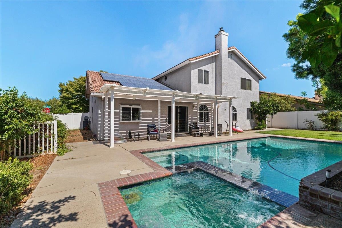 Exterior, Pool, Solar Panels