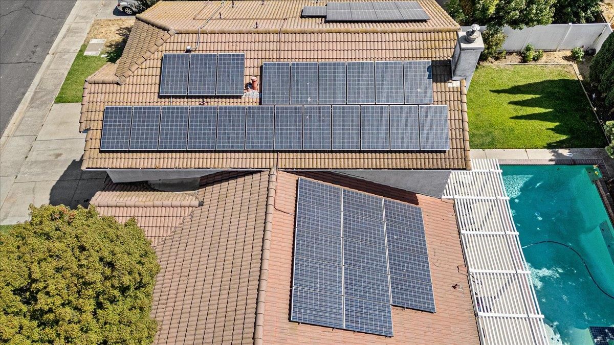 Exterior, Pool, Solar Panels