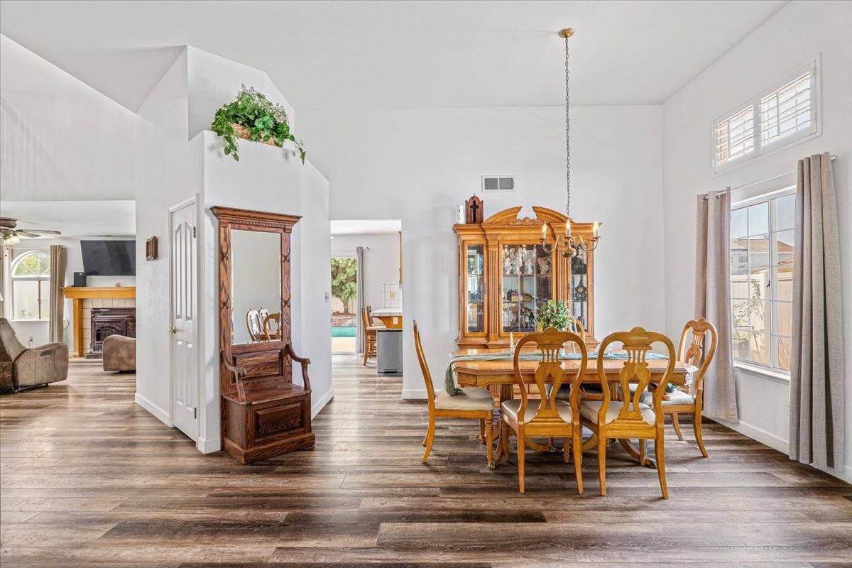 Dining room, Fireplace, Interior, Pendant Lights, Wood Texture Flooring