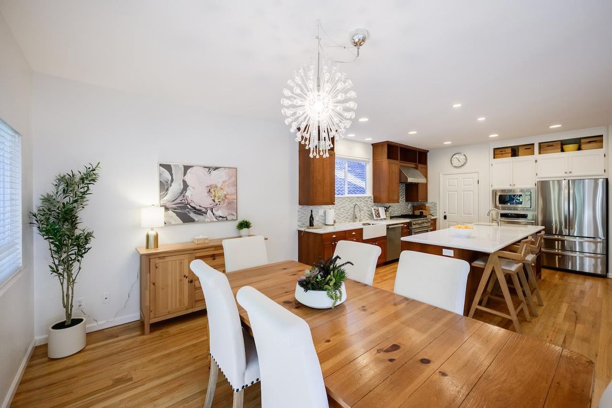 Chandelier, Dining room, Interior, Kitchen, Pendant Lights, Recessed Lighting, Stainless Steel Appliances, Wood Texture Flooring