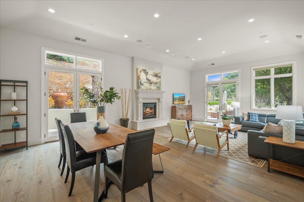 Dining room, Fireplace, Interior, Living room, Recessed Lighting, Wood Texture Flooring