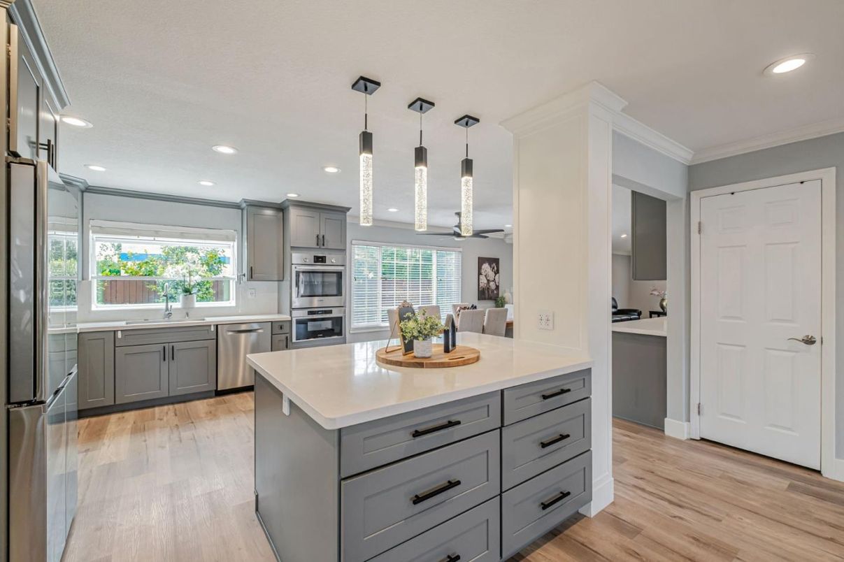Interior, Kitchen, Pendant Lights, Recessed Lighting, Stainless Steel Appliances, Wood Texture Flooring