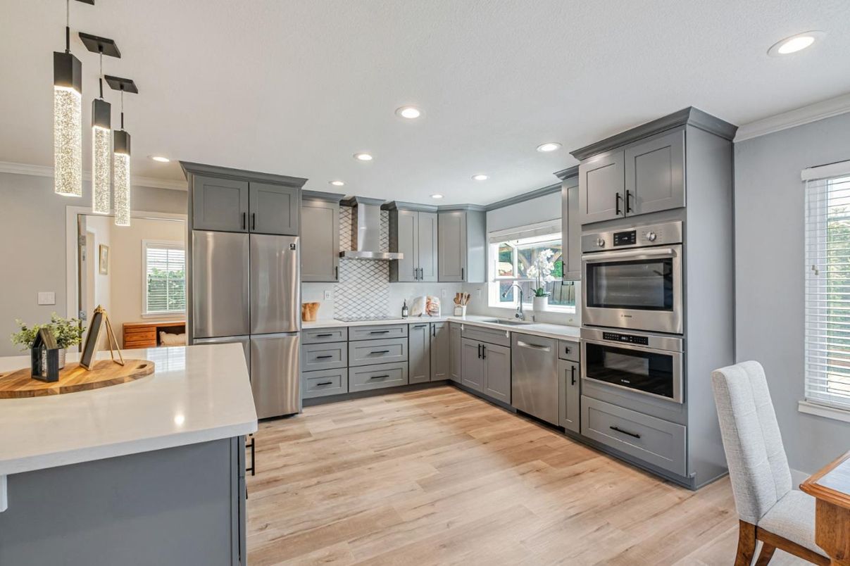 Interior, Kitchen, Pendant Lights, Recessed Lighting, Stainless Steel Appliances, Wood Texture Flooring