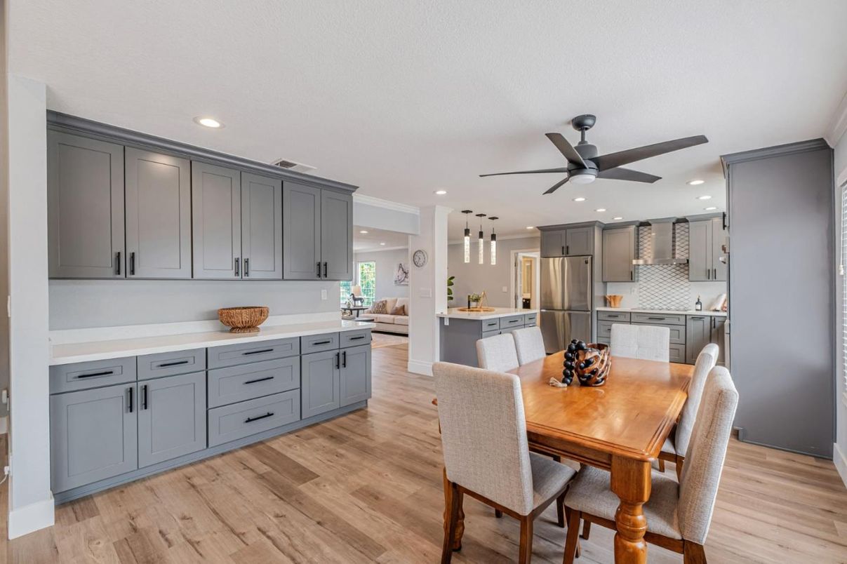 Dining room, Interior, Kitchen, Pendant Lights, Recessed Lighting, Stainless Steel Appliances, Wood Texture Flooring