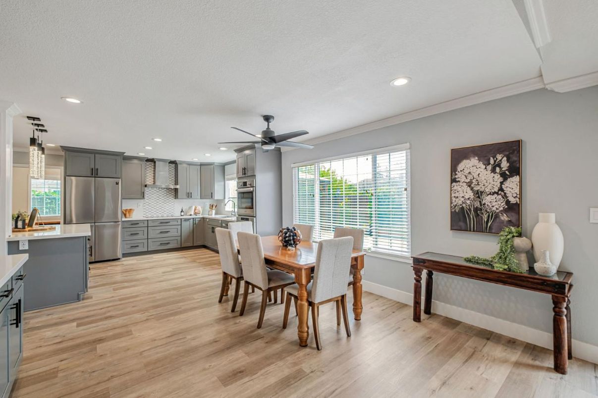 Dining room, Interior, Kitchen, Pendant Lights, Recessed Lighting, Stainless Steel Appliances, Wood Texture Flooring