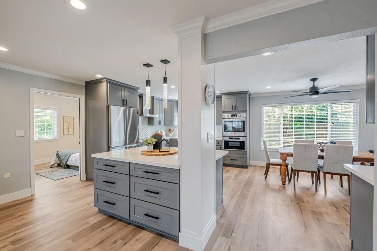Dining room, Interior, Kitchen, Pendant Lights, Recessed Lighting, Stainless Steel Appliances, Wood Texture Flooring