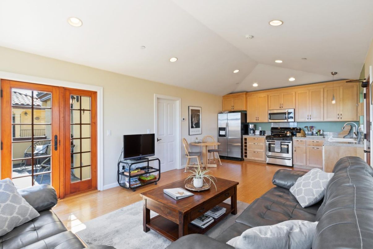 Dining room, Interior, Kitchen, Living room, Recessed Lighting, Stainless Steel Appliances, Wood Texture Flooring