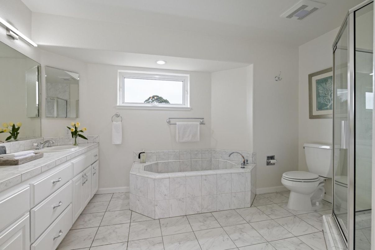 Bathroom, Dual Sink Vanities, Glass Shower, Interior, Marble, Recessed Lighting, Tile Countertops