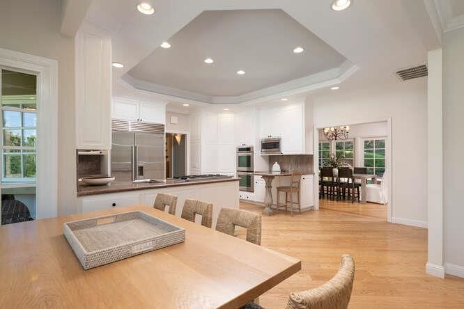 Chandelier, Dining room, Interior, Kitchen, Recessed Lighting, Stainless Steel Appliances, Wood Texture Flooring