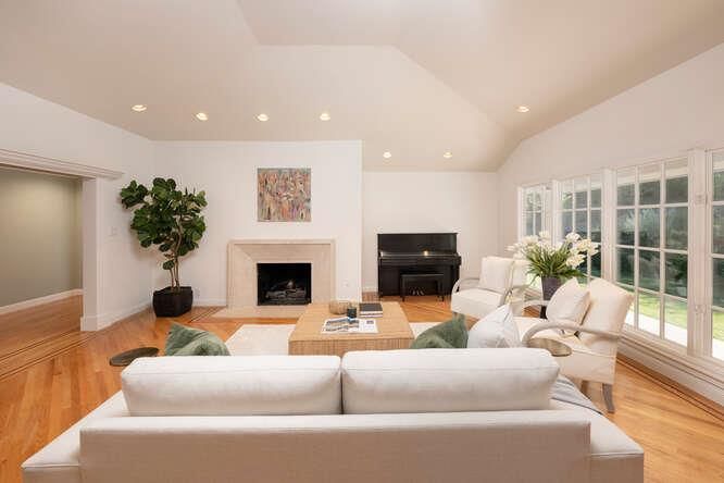 Fireplace, Interior, Living room, Piano, Recessed Lighting, Wood Texture Flooring