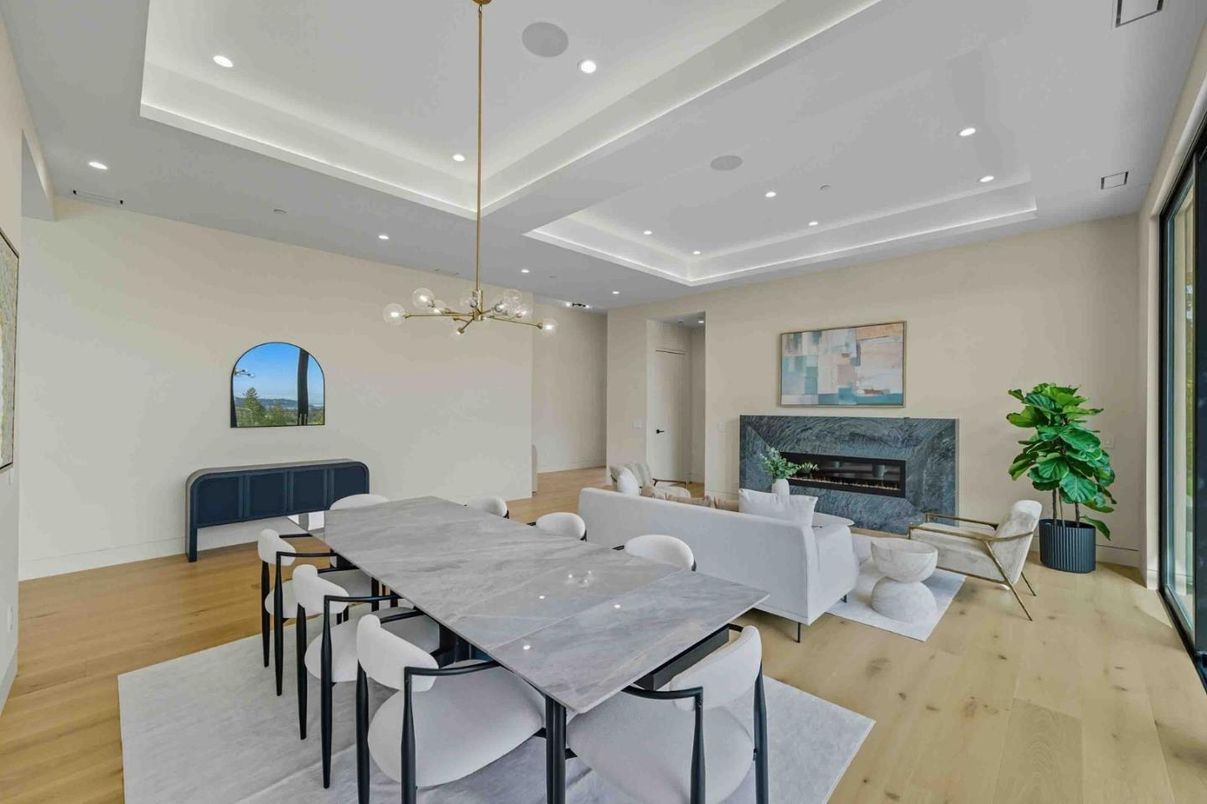 Dining room, Fireplace, Interior, Living room, Pendant Lights, Recessed Lighting, Wood Texture Flooring