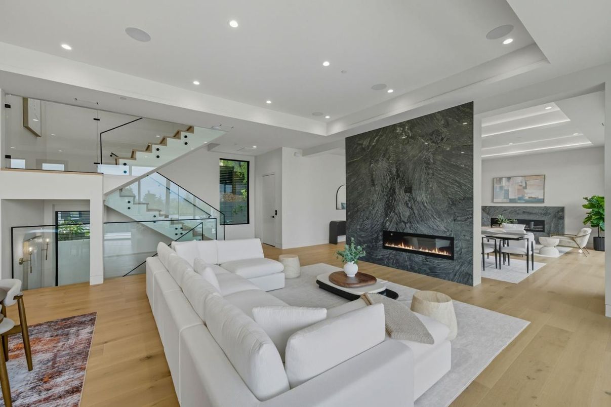 Fireplace, Interior, Living room, Marble Walls, Recessed Lighting, Wood Texture Flooring