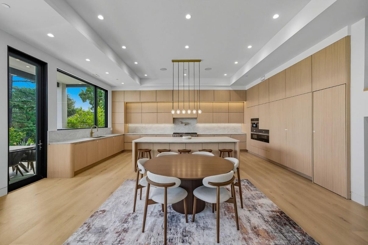 Dining room, Interior, Kitchen, Pendant Lights, Recessed Lighting, Stainless Steel Appliances, Wood Texture Flooring