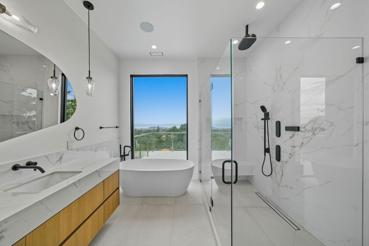 Bathroom, Dual Sink Vanities, Free Standing Baths, Glass Shower, Interior, Marble Walls, Pendant Lights, Recessed Lighting
