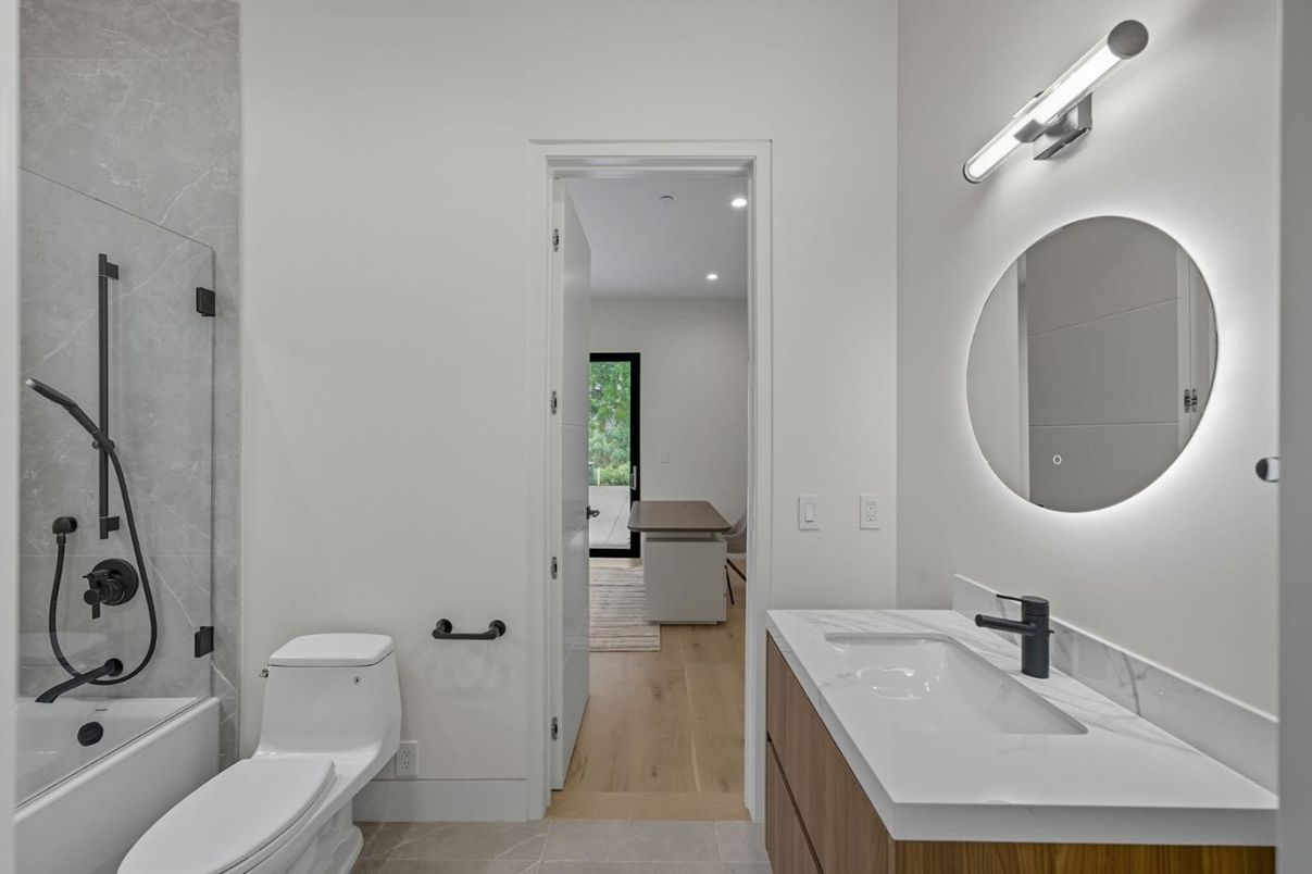 Bathroom, Dual Sink Vanities, Interior, Recessed Lighting, Wood Texture Flooring