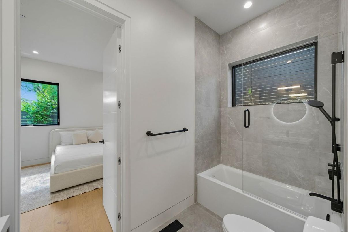 Bathroom, Bedroom, Glass Shower, Interior, Recessed Lighting, Wood Texture Flooring