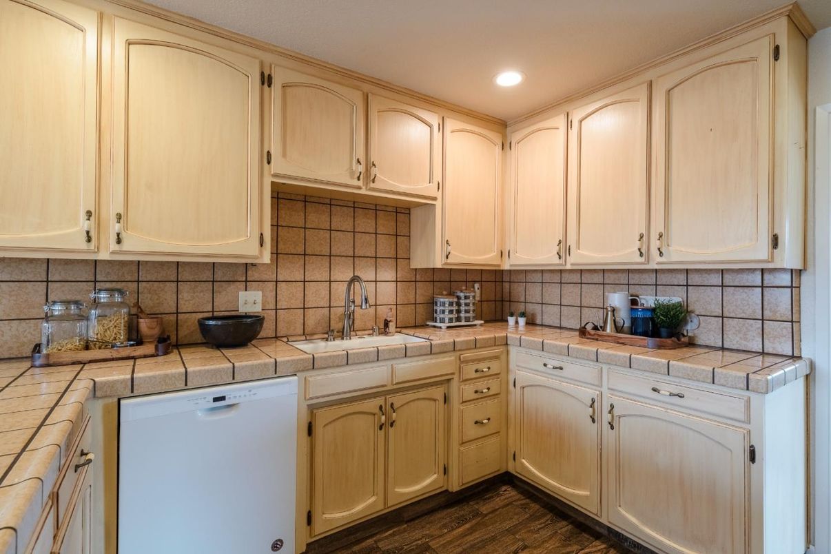Interior, Kitchen, Recessed Lighting, Tile Countertops, Wood Texture Flooring