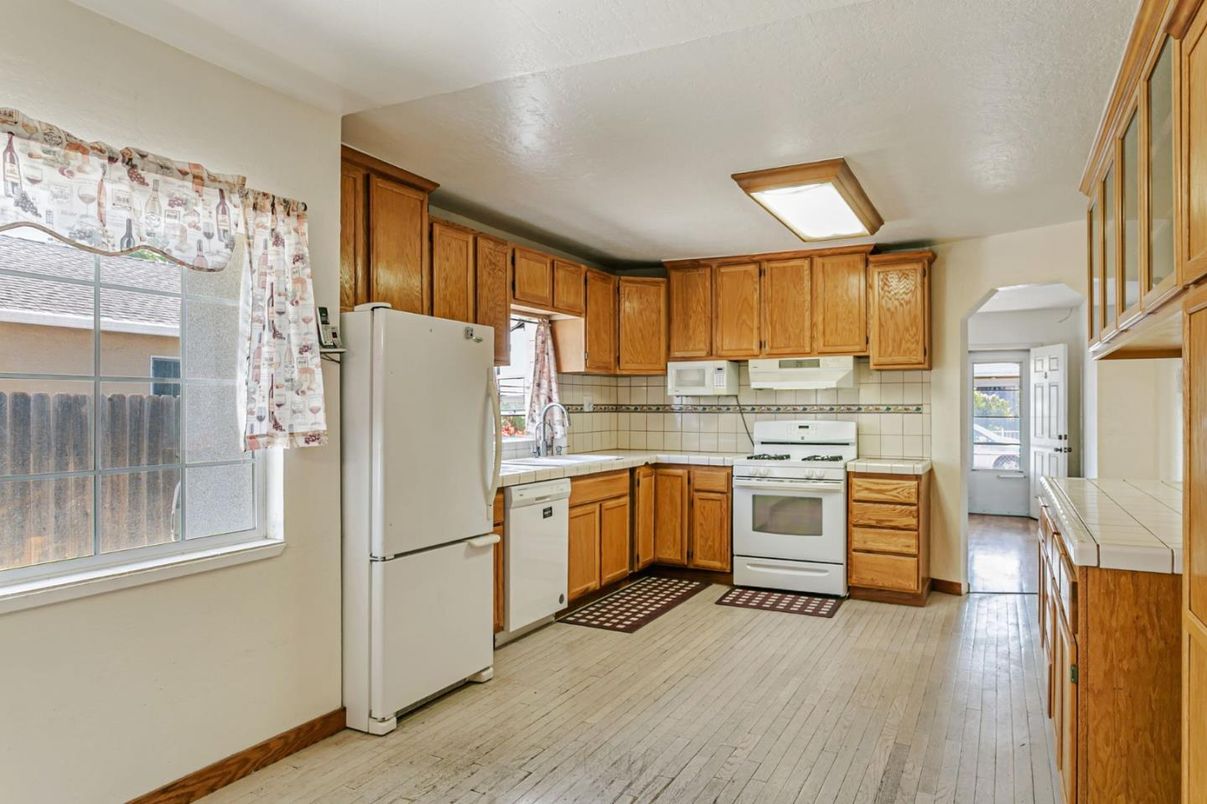 Interior, Kitchen, Tile Countertops, Wood Texture Flooring