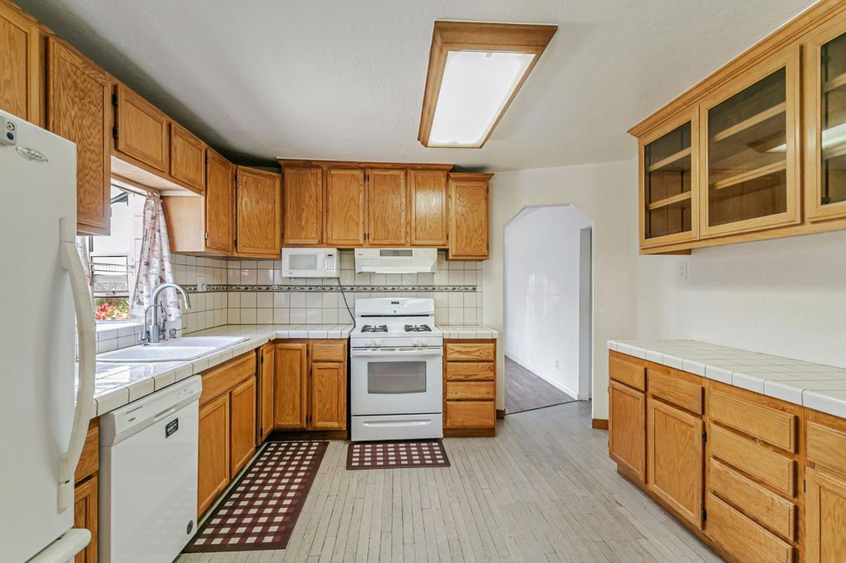 Interior, Kitchen, Tile Countertops, Wood Texture Flooring