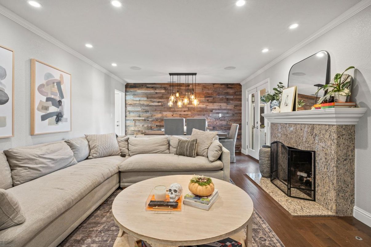 Dining room, Fireplace, Interior, Living room, Pendant Lights, Recessed Lighting, Stone Walls, Wood Texture Flooring, Wooden Walls
