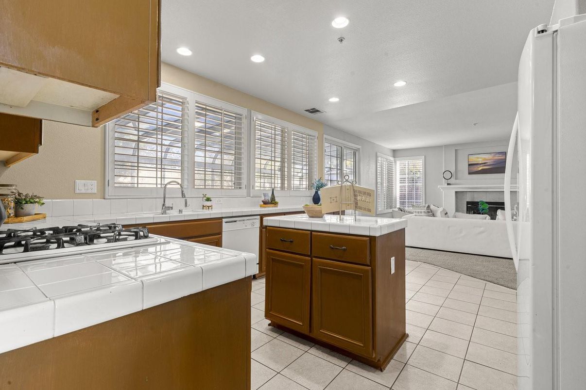 Fireplace, Interior, Kitchen, Living room, Recessed Lighting, Tile Countertops