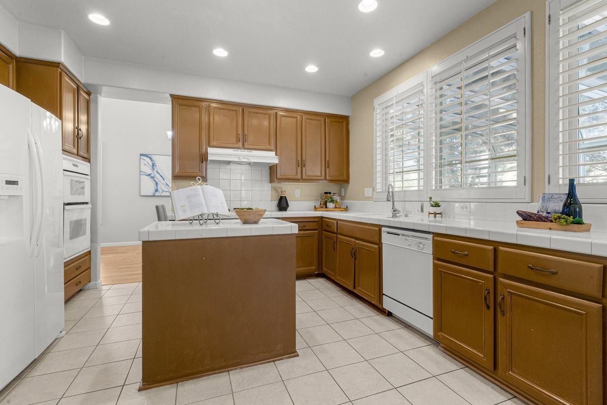 Interior, Kitchen, Recessed Lighting, Tile Countertops, Wood Texture Flooring