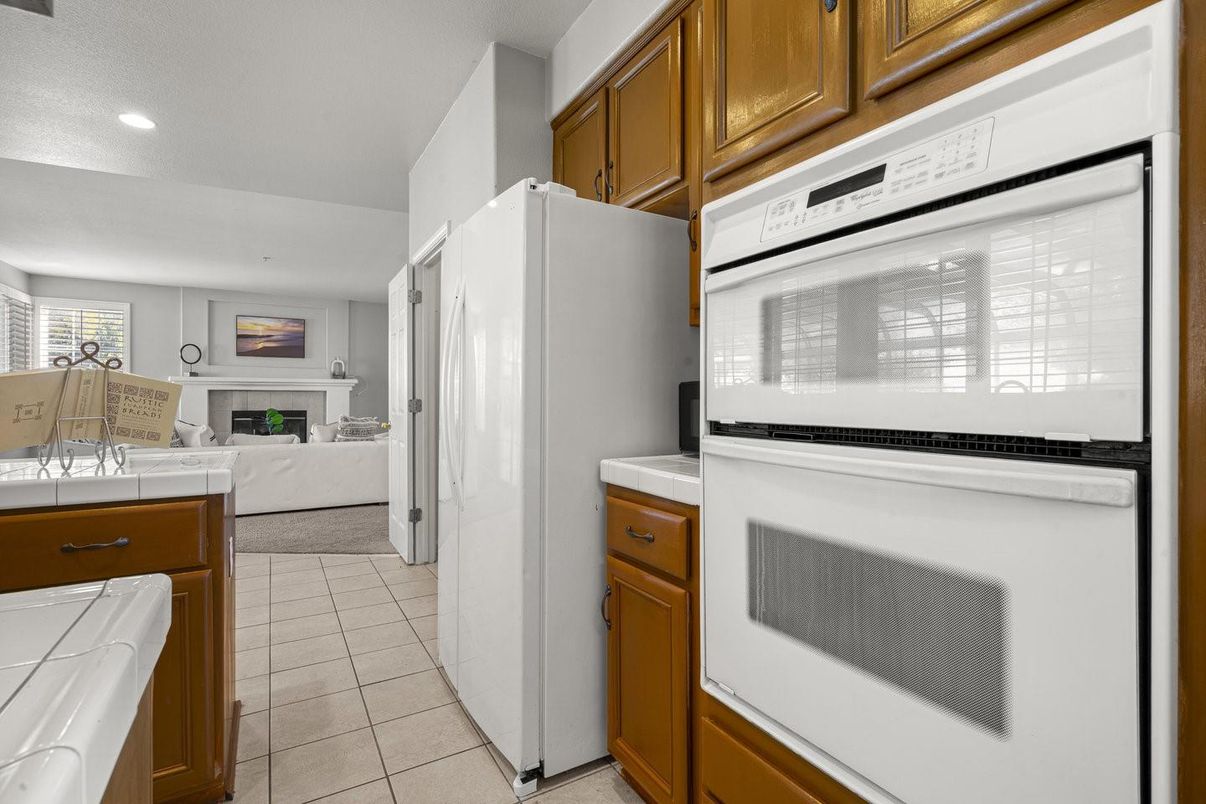 Fireplace, Interior, Kitchen, Living room, Recessed Lighting, Tile Countertops