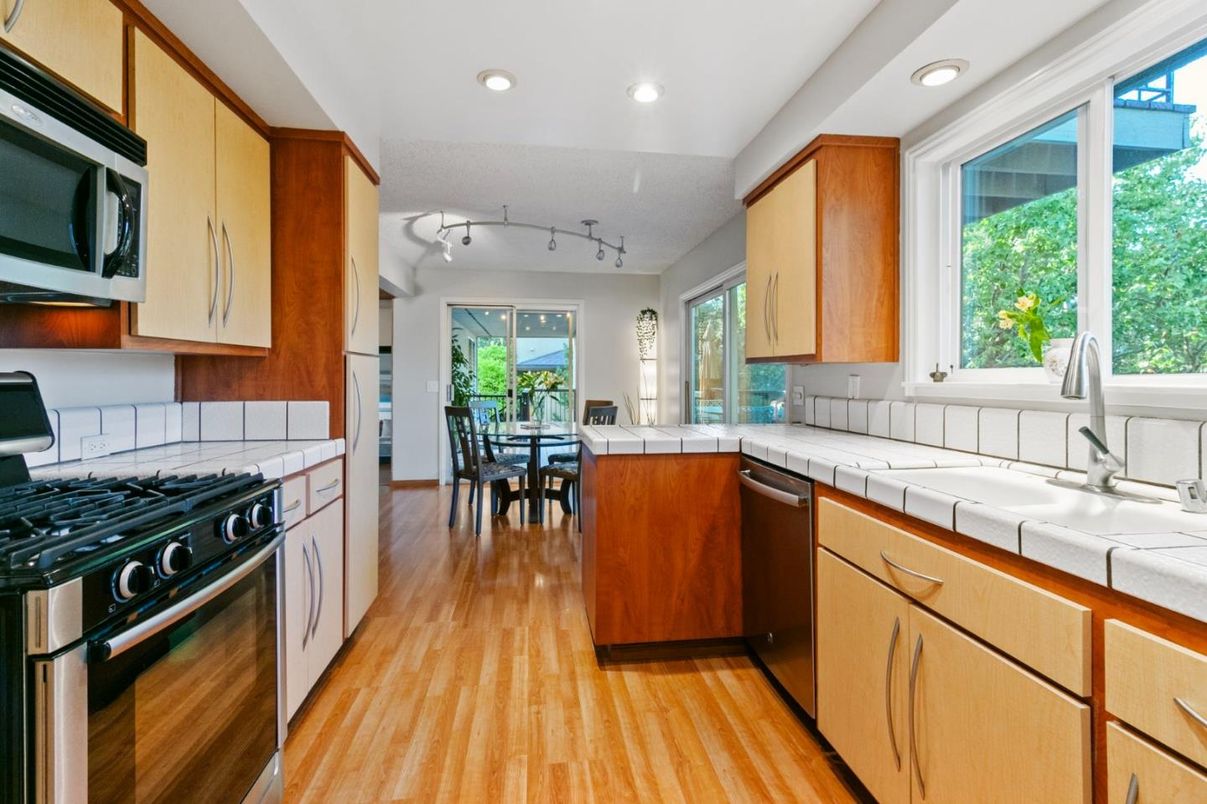 Dining room, Interior, Kitchen, Recessed Lighting, Tile Countertops, Wood Texture Flooring