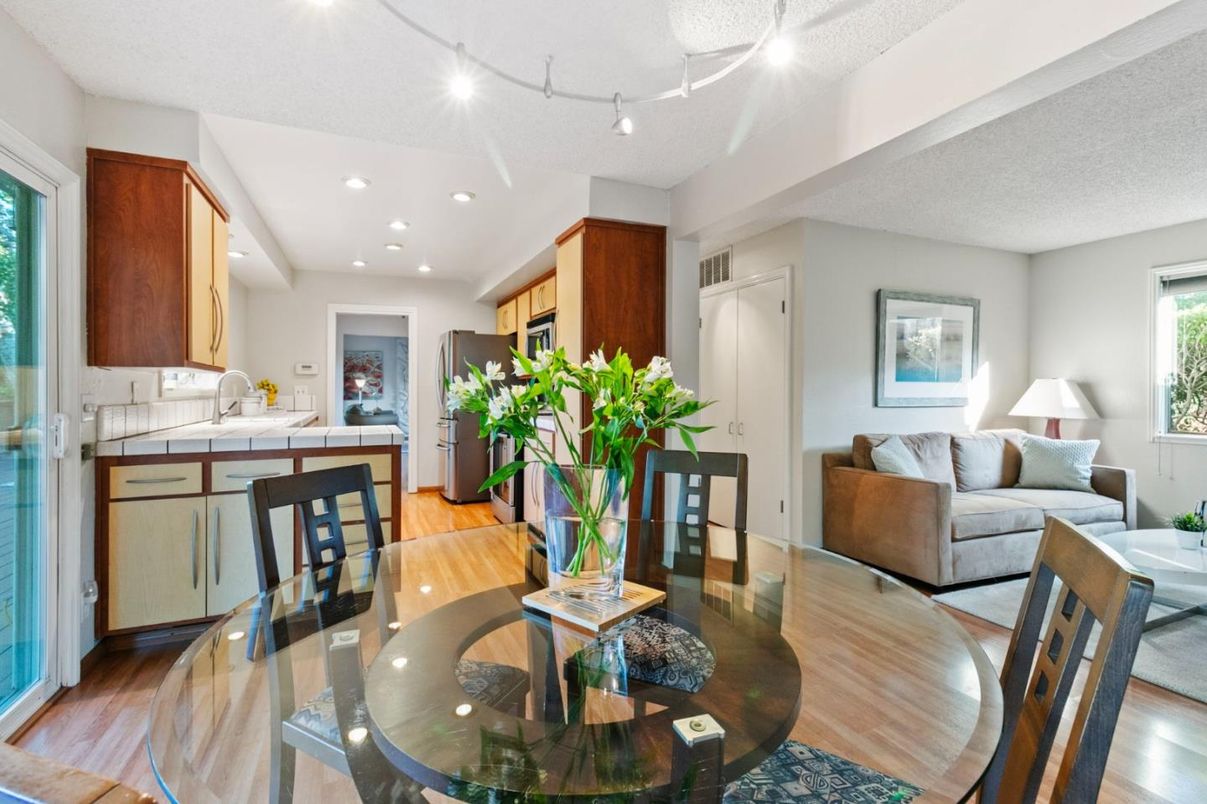 Dining room, Interior, Kitchen, Living room, Recessed Lighting, Tile Countertops, Wood Texture Flooring