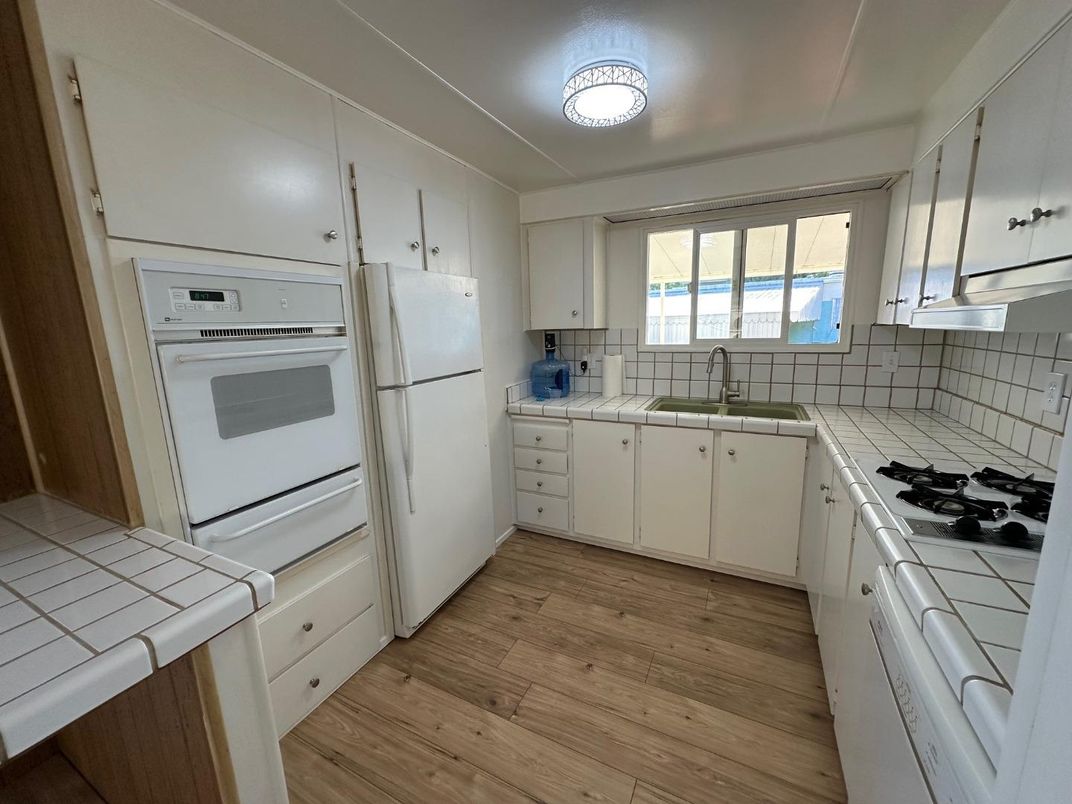 Interior, Kitchen, Tile Countertops, Wood Texture Flooring