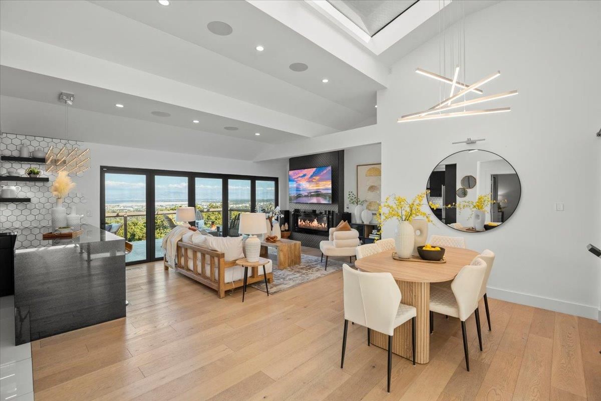 Dining room, Fireplace, Interior, Living room, Pendant Lights, Recessed Lighting, Wood Texture Flooring