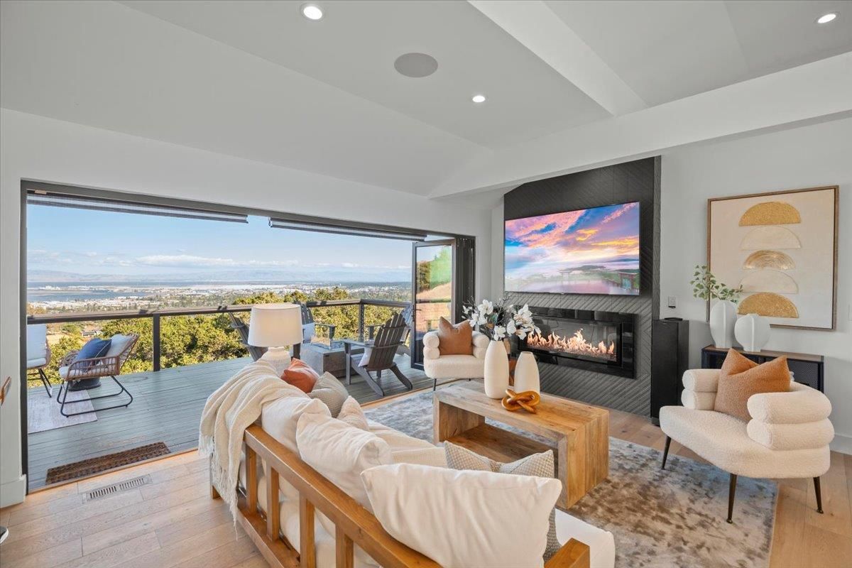 Fireplace, Interior, Living room, Recessed Lighting, Water, Wood Texture Flooring