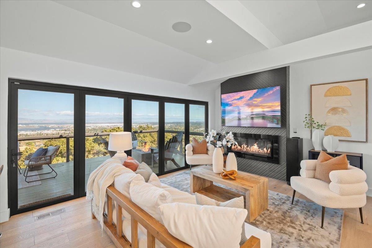 Fireplace, Interior, Living room, Recessed Lighting, Water, Wood Texture Flooring