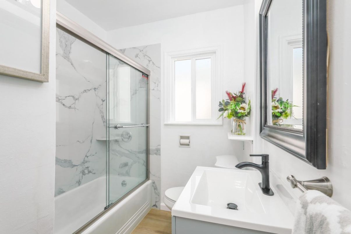 Bathroom, Glass Shower, Interior, Marble Walls, Wood Texture Flooring