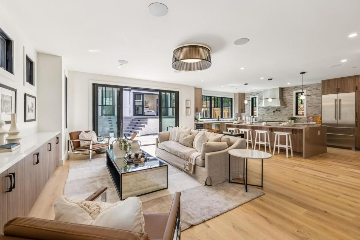 Interior, Kitchen, Living room, Pendant Lights, Recessed Lighting, Stainless Steel Appliances, Stone Walls, Wood Texture Flooring