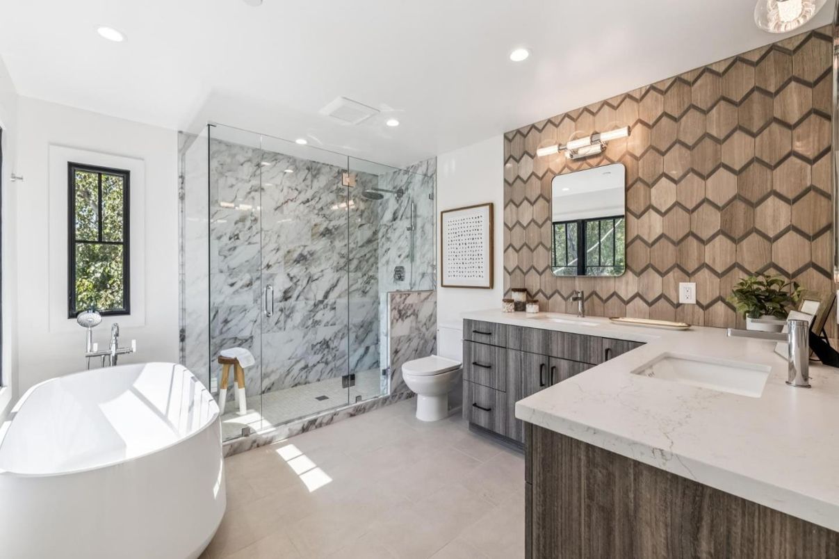 Bathroom, Dual Sink Vanities, Free Standing Baths, Glass Shower, Interior, Marble Walls, Recessed Lighting