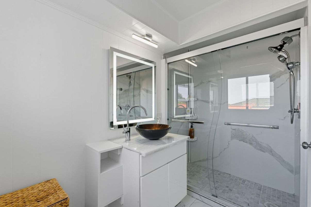 Bathroom, Dual Sink Vanities, Glass Shower, Interior, Marble Walls